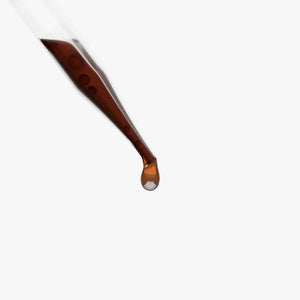 Adaptogen Immunity Drops lifestyle image with liquid mushroom drops bottle